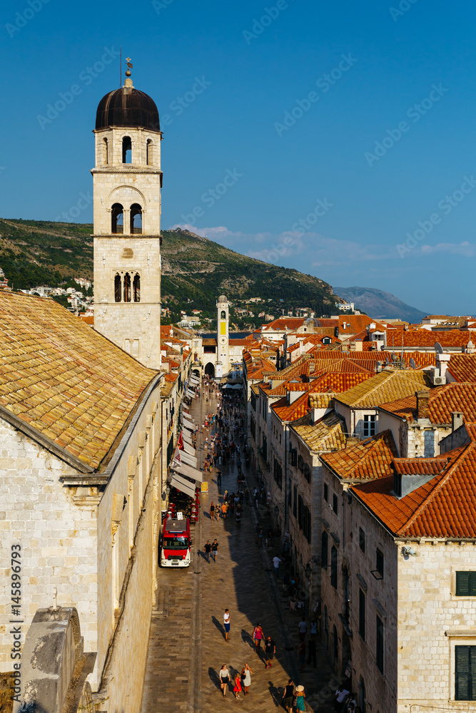 Tower of the Franciscan Monastery or Church of the Small Brotherhood on Stradun Street in Dubrovnik, Croatia.