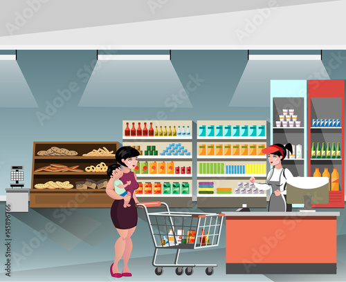 A Young cashier woman standing in supermarket.