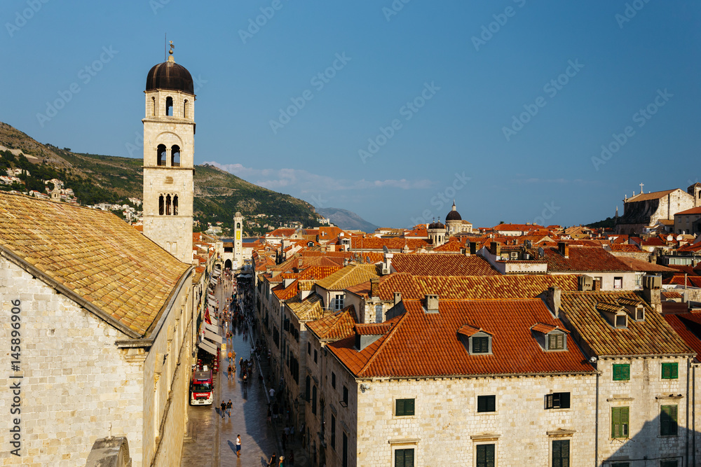 Tower of the Franciscan Monastery or Church of the Small Brotherhood on Stradun Street in Dubrovnik, Croatia.