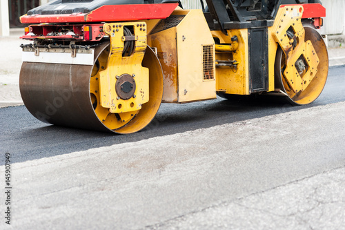 Road roller at work. Work of asphalting a road. © Franco Nadalin