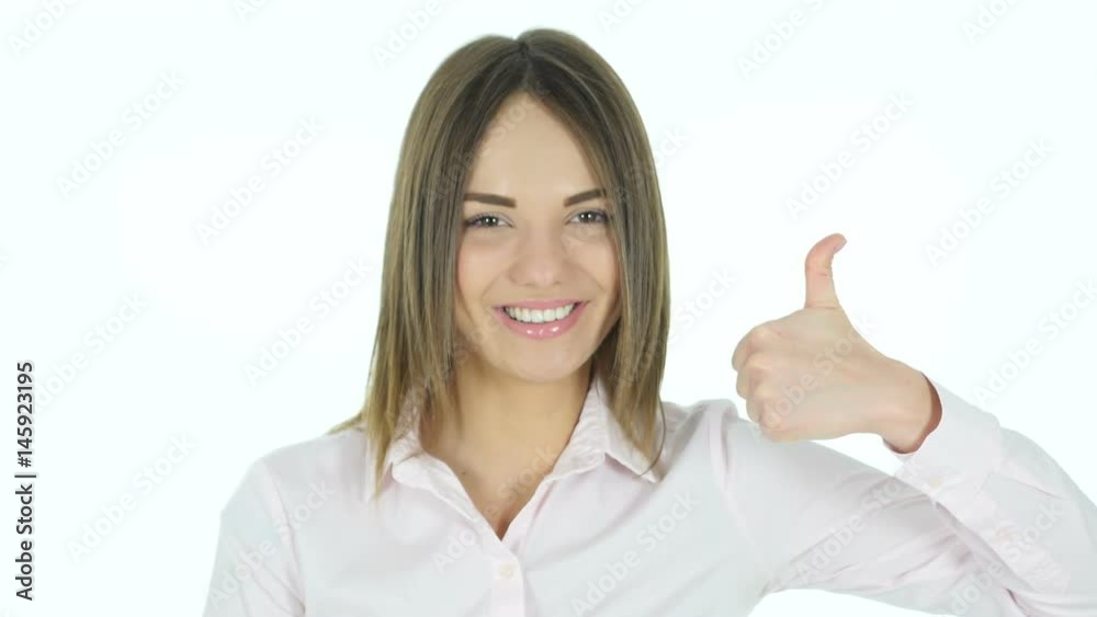 Thumbs Up by Beautiful Woman on White Background Thumbs Up by Beautiful Woman on White Background