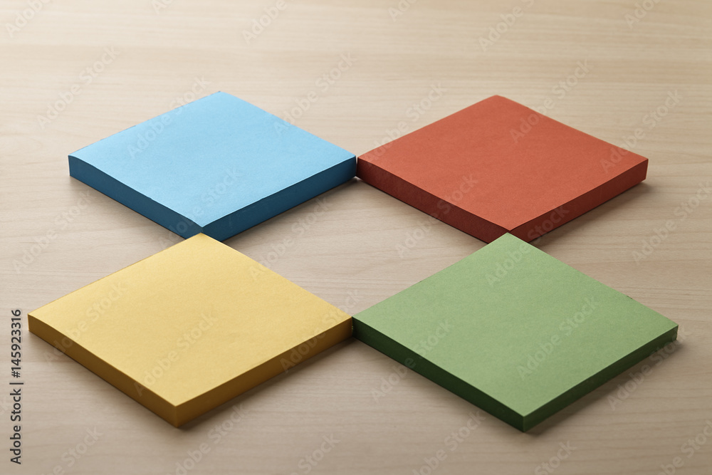 Colorful sticky notes on table