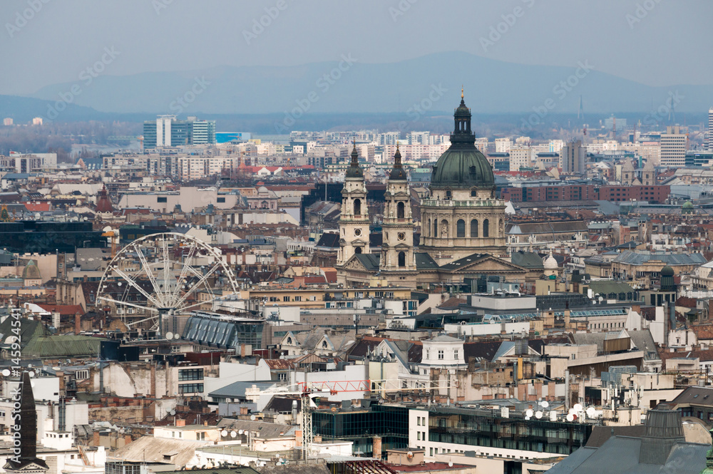 Scenic view of Pest side with St. Stephen's Basilica by a day in Budapest, Hungary