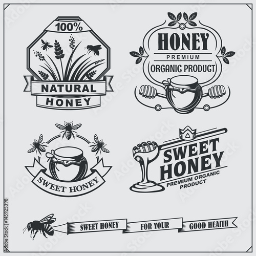 Set of honey labels, badges, emblems and design elements.