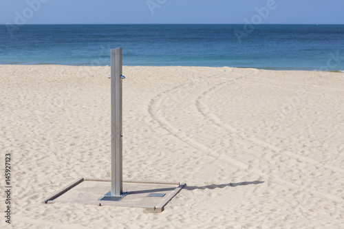 Fototapeta Naklejka Na Ścianę i Meble -  Modern shower on a beach