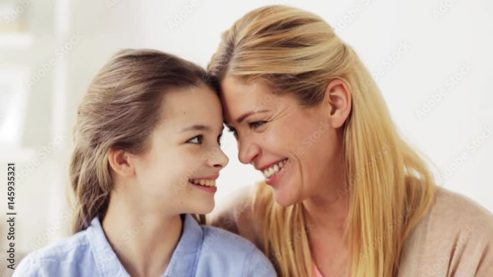 happy mother and girl looking at each other happy mother and girl looking at each other