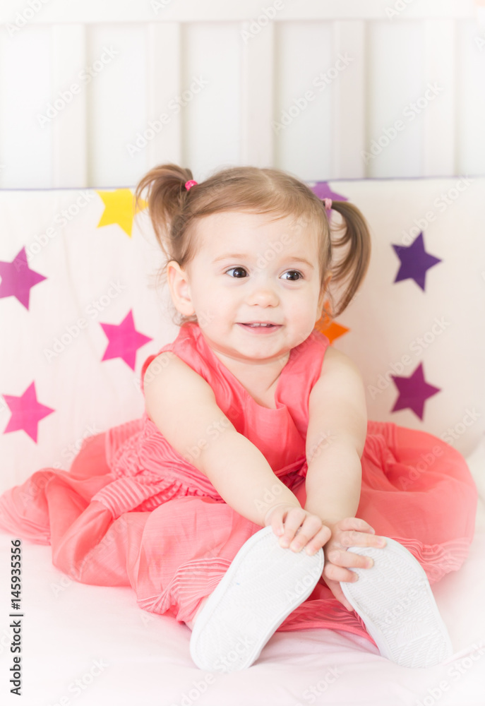 Cuteness.Happy little girl at studio with pink princesse dress Cuteness.Happy little girl at studio with pink princesse dress