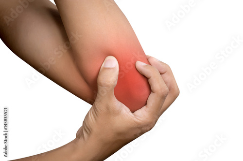 Woman suffering from chronic joint rheumatism. Elbow pain and treatment concept.