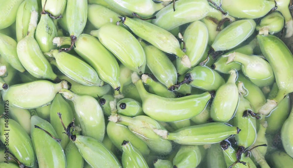 Raw Cultivated banana soaked in cold water. Raw Cultivated banana soaked in cold water.