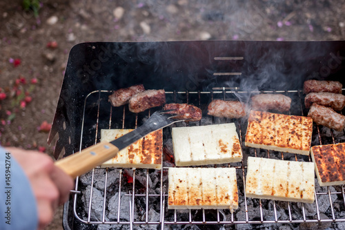 grilled cevapcici and cheese balkan cuisine photo