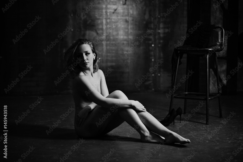 Black and White Beautiful sexy fitness woman body. Fashion art studio  portrait of elegant naked lady with shadow on her. Erotic pose low key  shoot. Nude sensual girl Stock-bilde | Adobe Stock