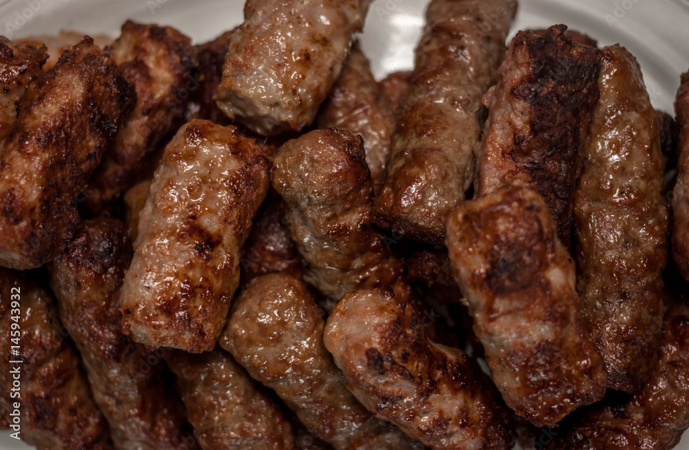 plate with grilled cevapcici balkan cuisine