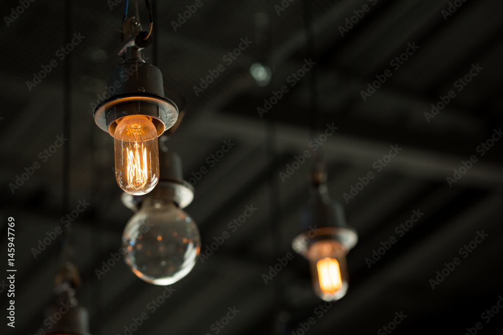Close up of Illuminated light bulb with copy space. Close up of Illuminated light bulb with copy space.