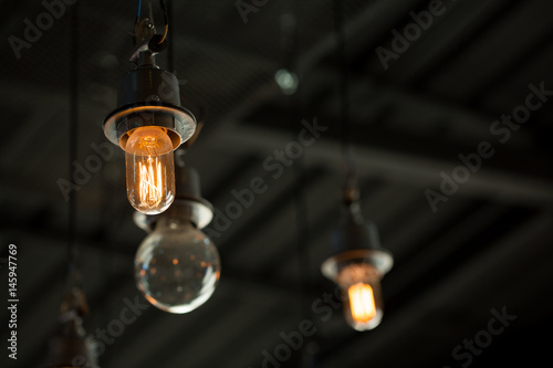 Close up of Illuminated light bulb with copy space.