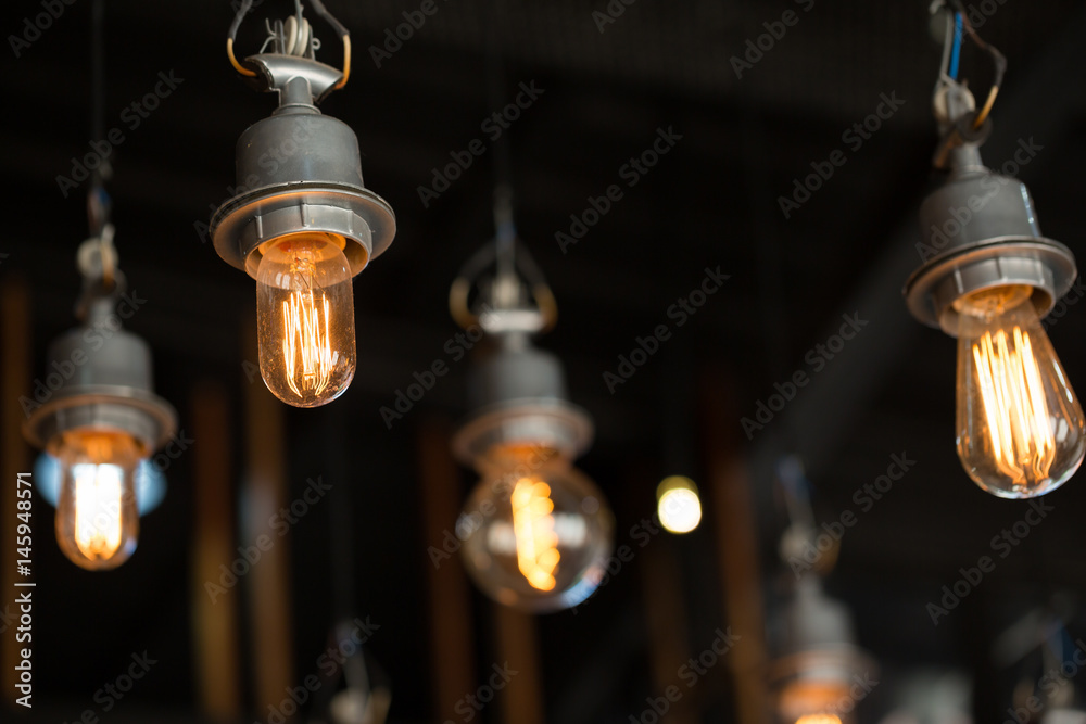 Close up of Illuminated light bulb with copy space. Close up of Illuminated light bulb with copy space.