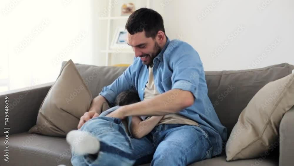 father with son playing and having fun at home father with son playing and having fun at home