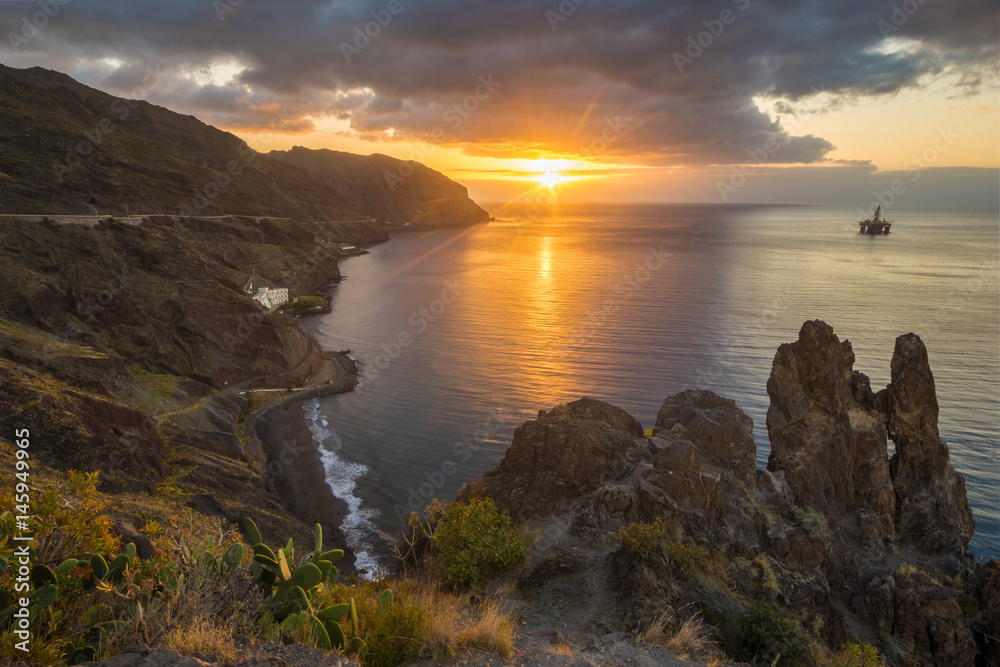Tenerife, mountains anaga-sunrise over ocean and cliff