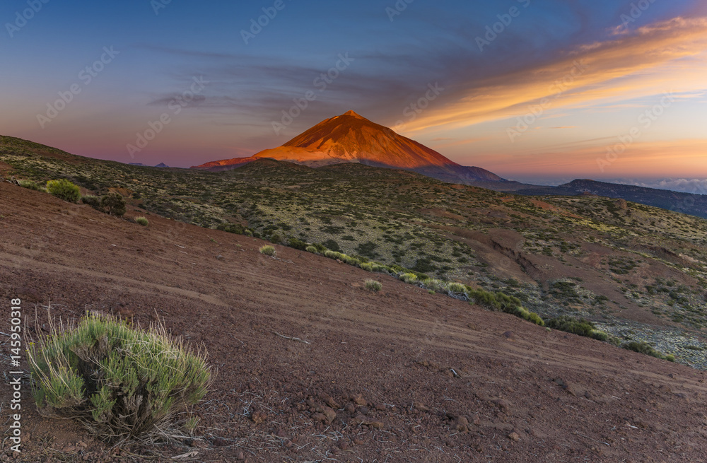 Fototapeta premium Tenerife, Teide volcano national park,Dawn over the slopes of the volcano, ocean view