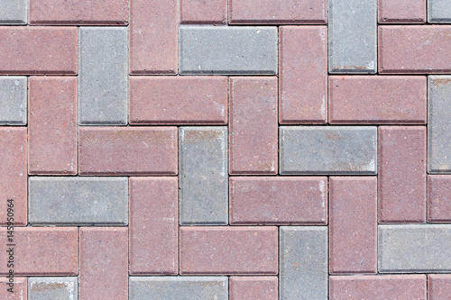 Brick pavement tile, top view. Texture as background.
