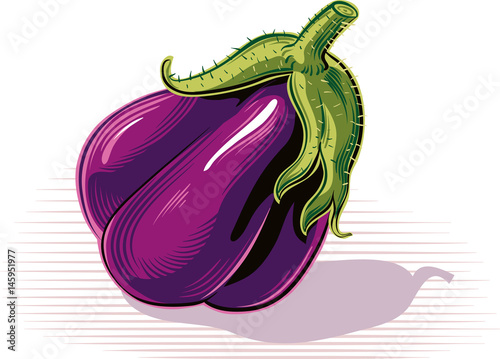 ripe aubergine, resting on a table.