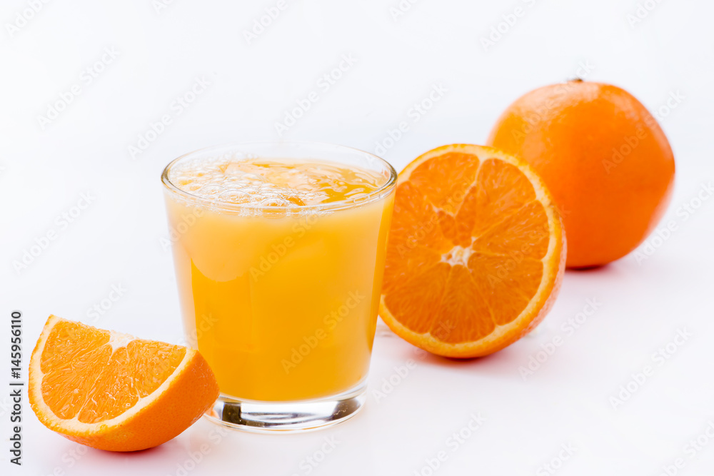 glass of orange juice, fresh on a light background glass of orange juice, fresh on a light background