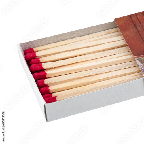 Part of matchbox full of wooden matches with red sulfur isolated on white background