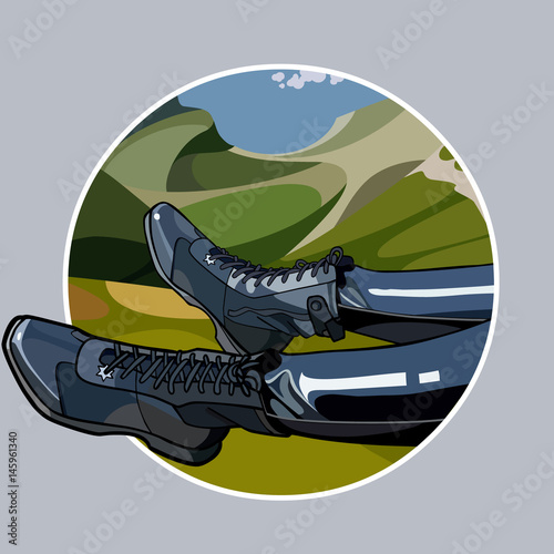 picture of feet in black boots on the background of nature