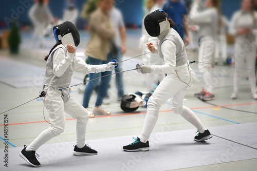 Junior Girls at a foil fencing tournament Fototapeta