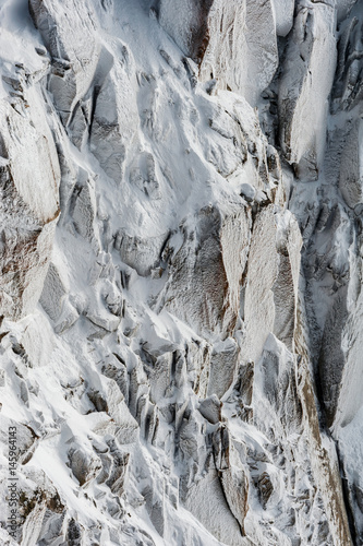 Surface hoar ice crystals formed on rockface in winter