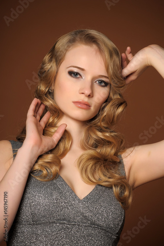 a beautiful young blonde in retro style photo
