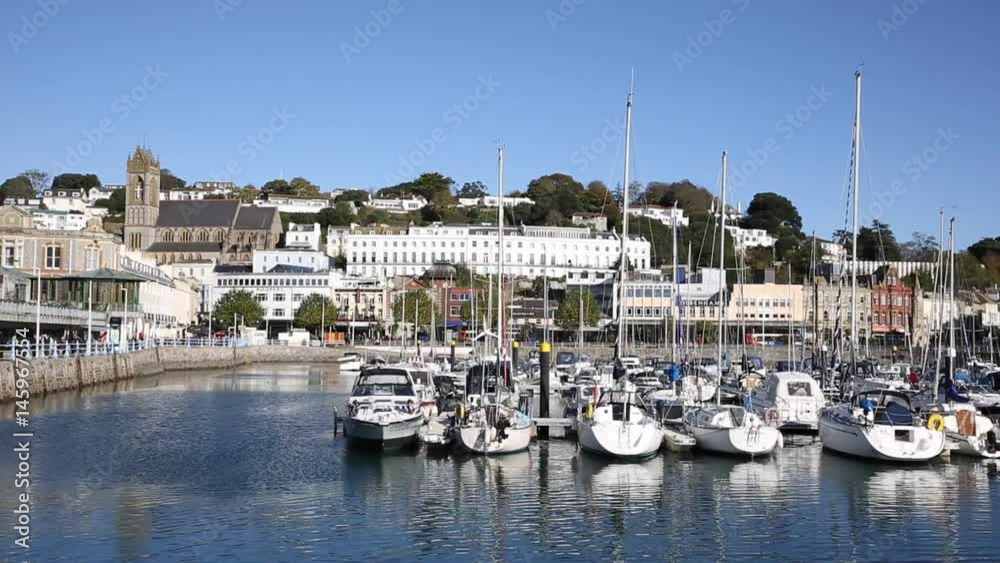 Torquay harbour Devon UK harbour with boats and yachts pan Torquay harbour Devon UK harbour with boats and yachts pan