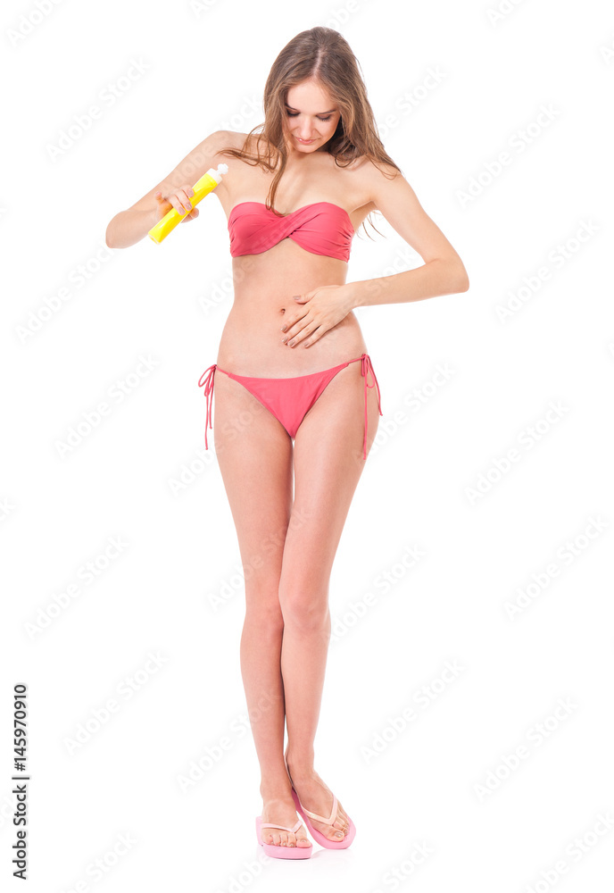 Female applying cosmetic cream for skin care isolated on white background