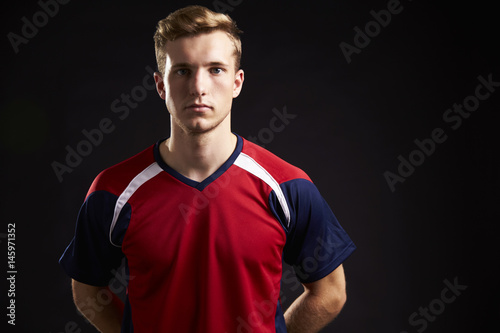 Fototapet Portrait Of Professional Soccer Player In Studio