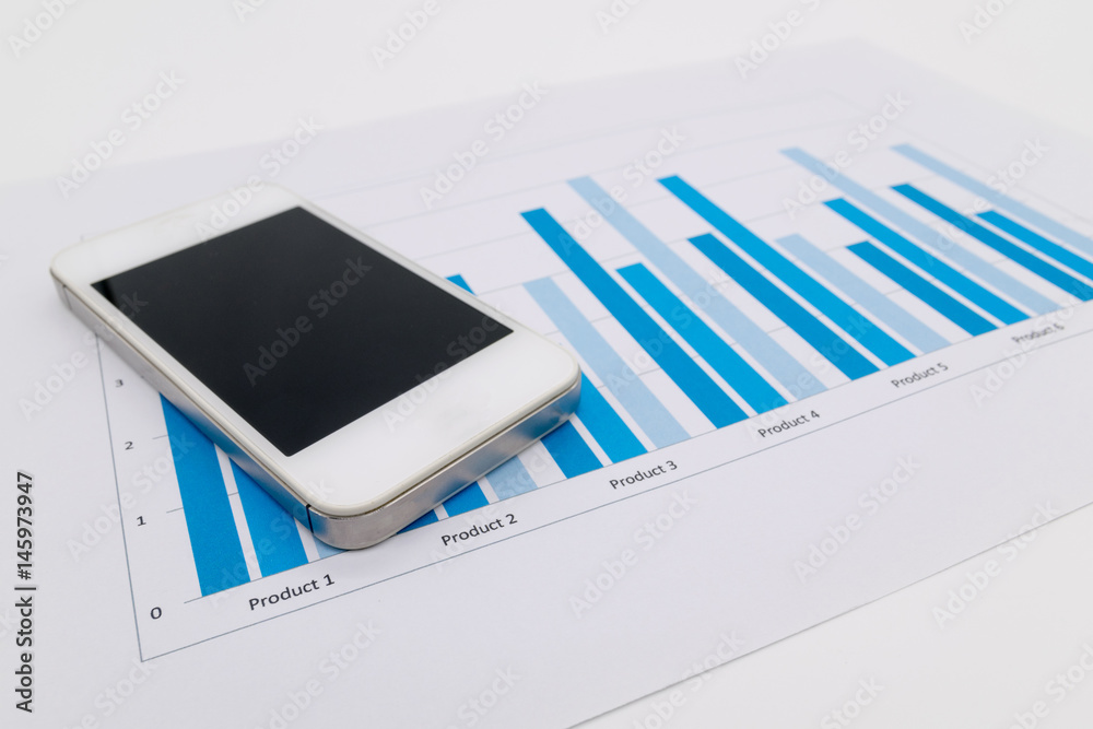 Mobile smart phone and graph report, fintech concept. Mobile smart phone and graph report, fintech concept.