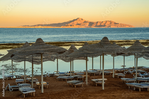 View of Red Sea coastline at sunset time photo