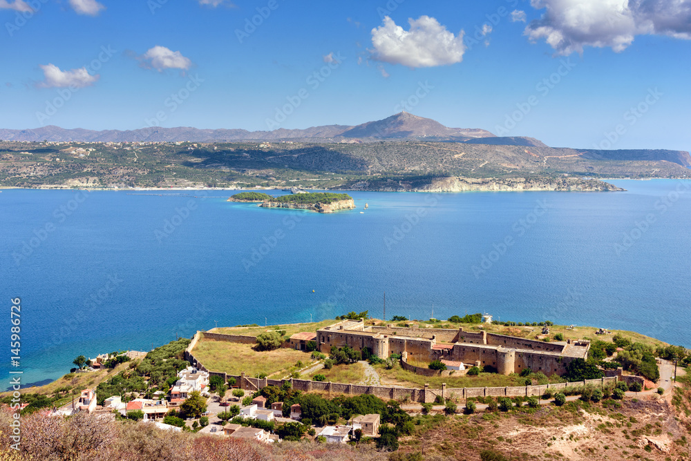 View on sea bay and old Venetian fortress in Aptera on Crete island, Greece