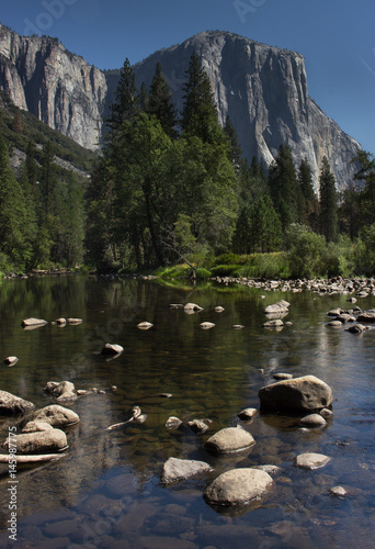 Peaceful lake and granite cliffs in the Yosemite Valley