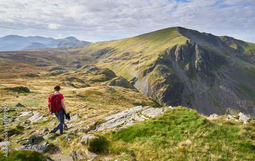 Fotografie, Tablou A hiker descending from High Spy towards the summit of Dale Head in the Lake District, England, UK