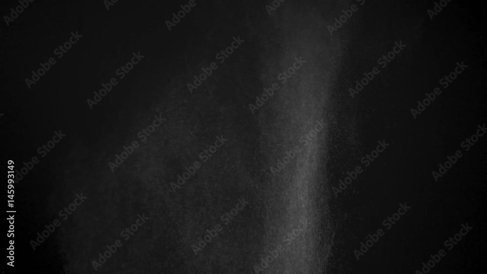 White powder exploding isolated on black White powder exploding isolated on black