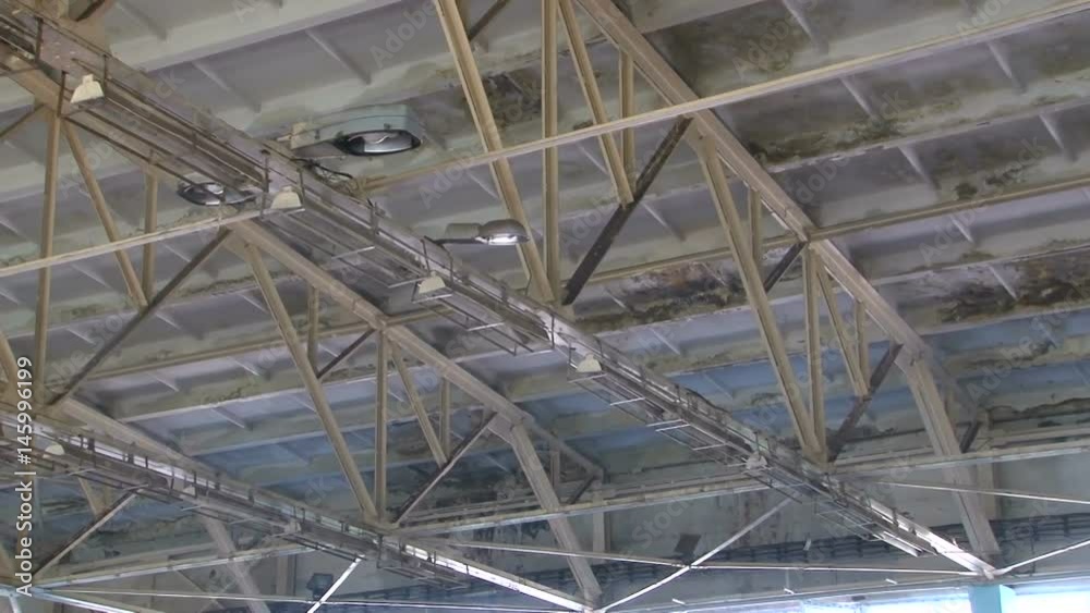 Building is ruined with moisture. Mould damage the walls and ceiling, green and black fungus Building is ruined with moisture. Mould damage the walls and ceiling, green and black fungus