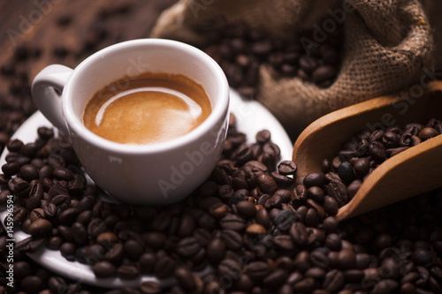 Coffee on the coffee beans background