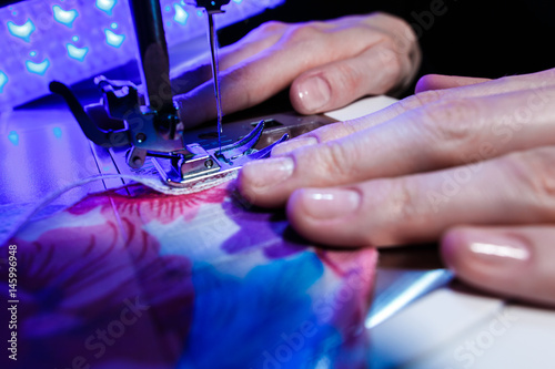 the theme of needlework , sewing, dressmaking, sewing machine
