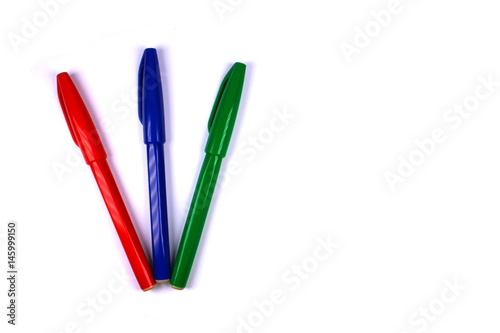 Red, blue and green pen isolated on white background