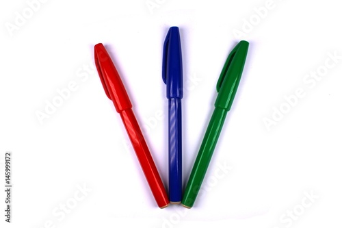 Red, blue and green pen isolated on white background
