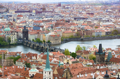 Panorama of Prague with Red Roofs from Above Summer Day at Dusk, View from the height, The Charles Bridge Czech Republic