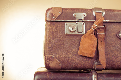 Vintage travel case with leather tag for background