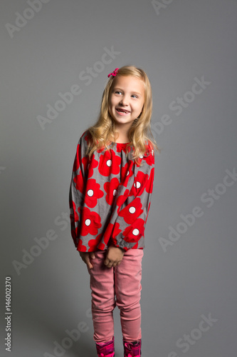 Studio portrait of an excited girl