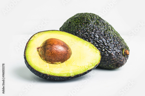 avocado on a dark wood background