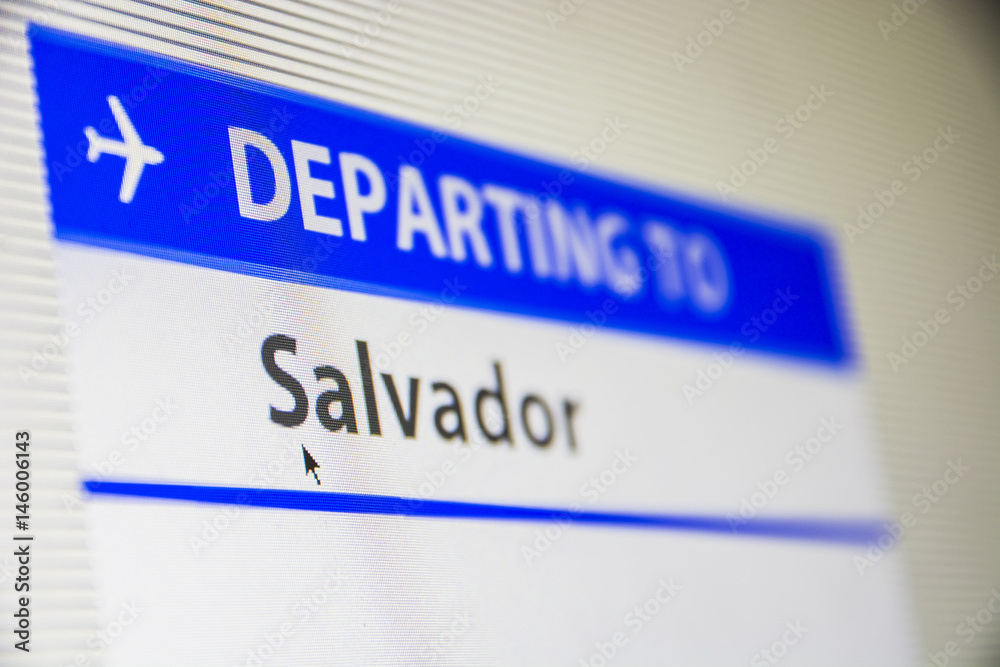 Computer screen close-up of status of flight departing to Salvador, Brasil