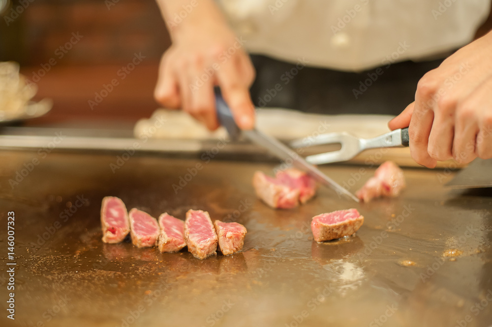 Grilling beef steak (japan kobe matsusaka),japanese style lobster, tepan yaki,selective focus ,vintage color Grilling beef steak (japan kobe matsusaka),japanese style lobster, tepan yaki,selective focus ,vintage color